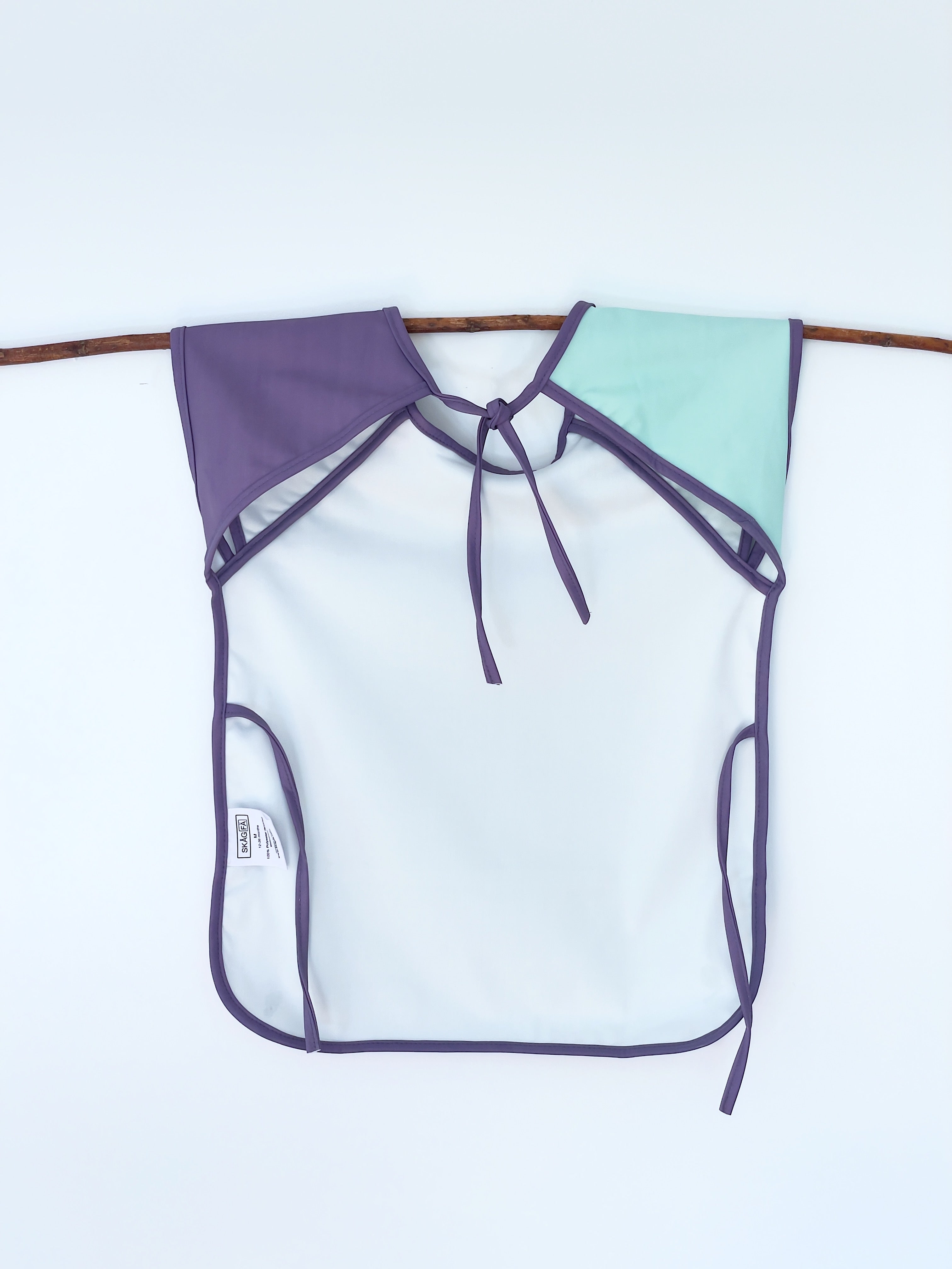 Baby's first apron for family cooking session, featuring colorful and child-friendly design, perfect for engaging young children in kitchen activities safely. Award winner company brand