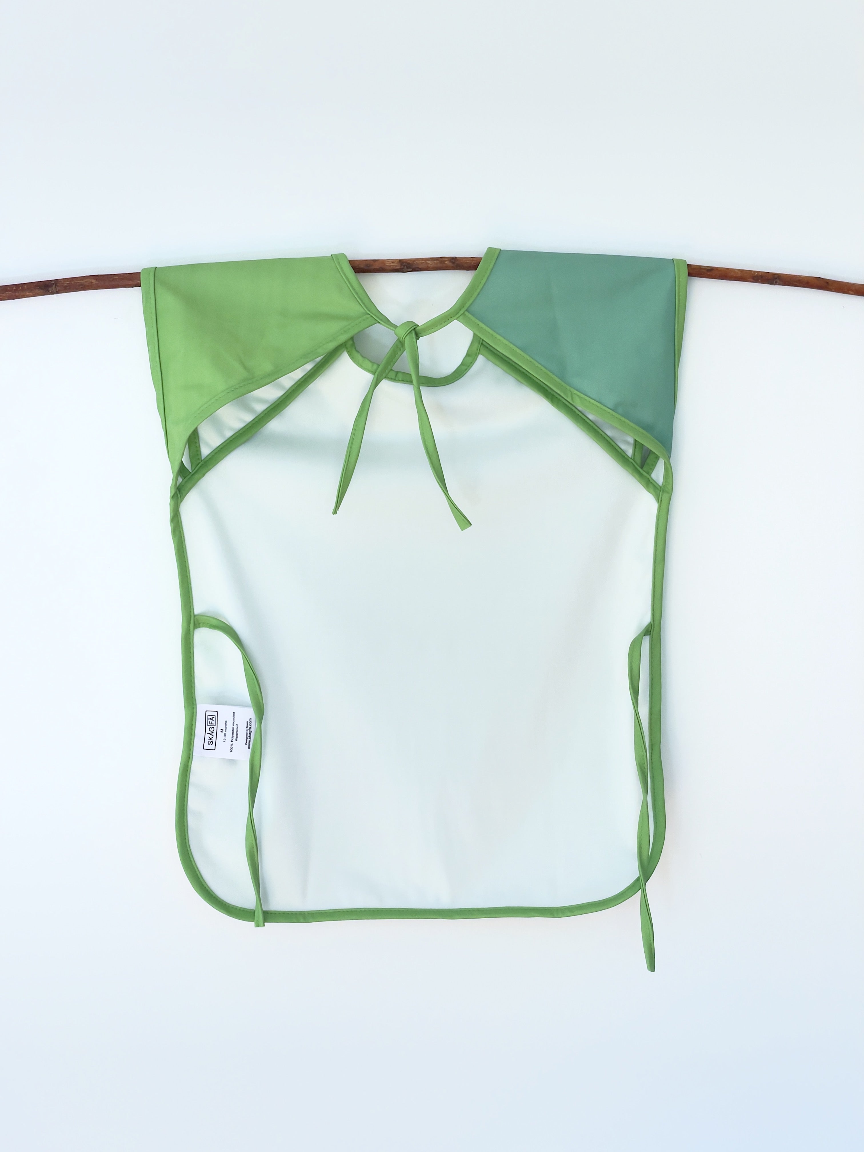Baby's first apron for family cooking session, featuring colorful and child-friendly design, perfect for engaging young children in kitchen activities safely. Award winner company brand