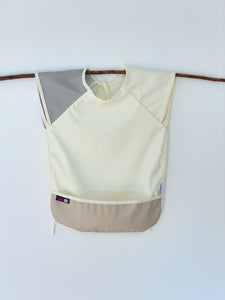Waterproof babie Bib designed in Spain  scandinavian design mediterranean design  100% recycled polyester Eco friendly Nature
